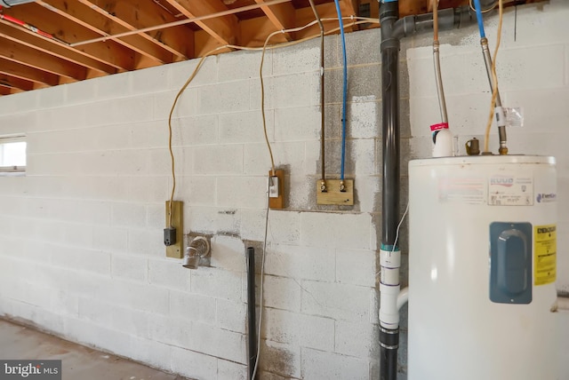 utility room with electric water heater