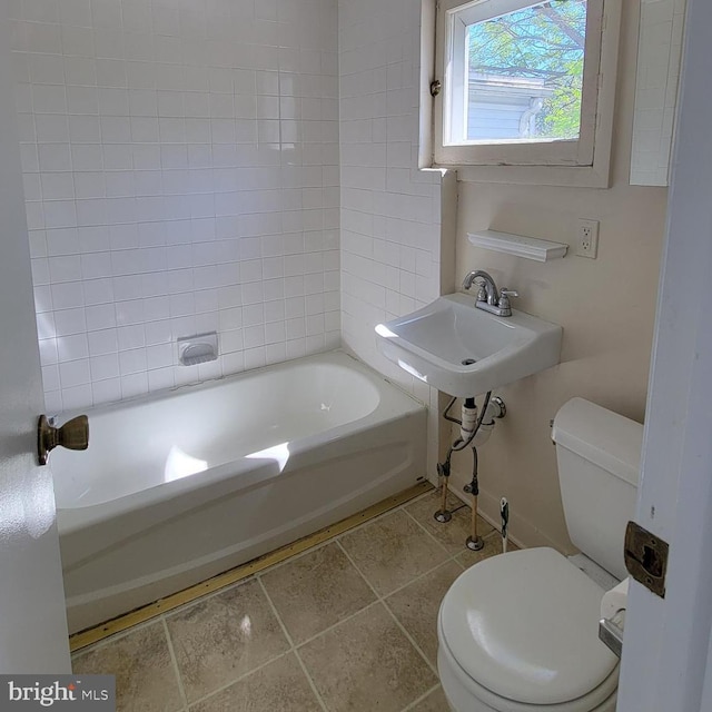 bathroom featuring toilet and sink