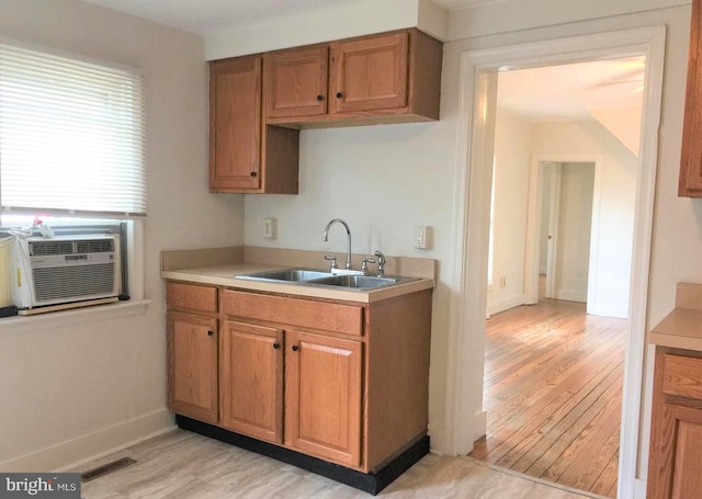 kitchen featuring light hardwood / wood-style floors and sink