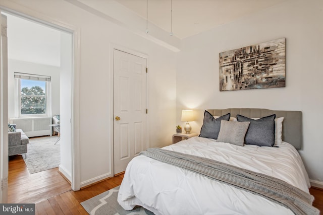 bedroom with light wood-type flooring