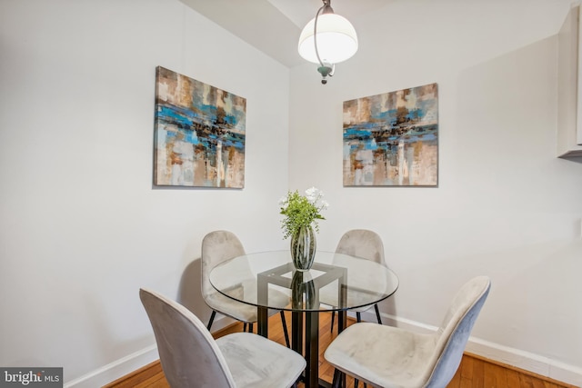 dining room featuring hardwood / wood-style flooring