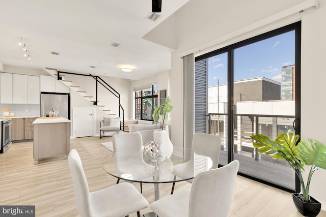 dining room featuring light hardwood / wood-style floors