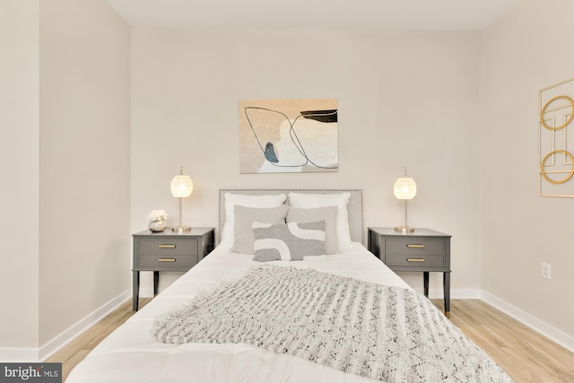 bedroom featuring light wood-type flooring