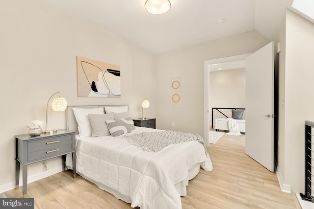 bedroom featuring light hardwood / wood-style floors