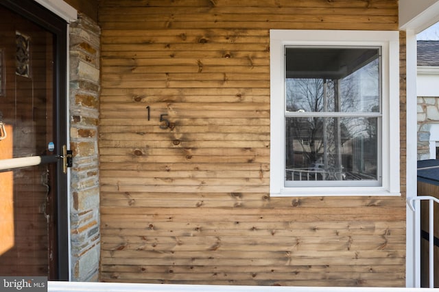 interior details featuring wooden walls