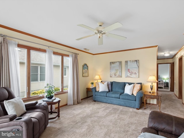 living room with light carpet, ceiling fan, and crown molding