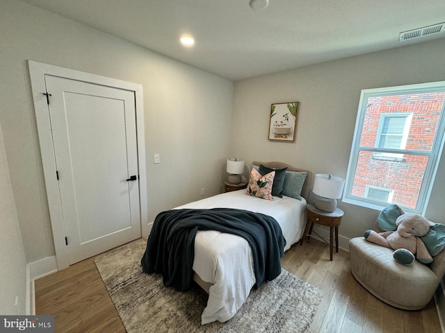 bedroom featuring light wood-type flooring