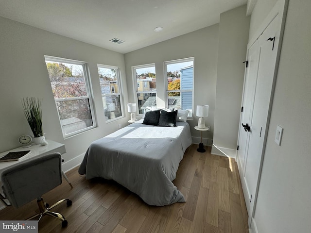 bedroom with light hardwood / wood-style flooring