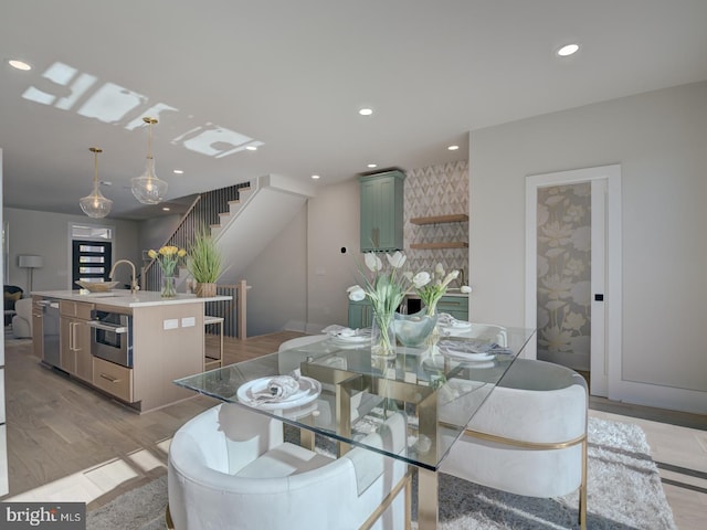 dining area featuring light hardwood / wood-style flooring