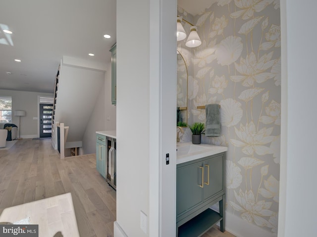 interior space featuring hardwood / wood-style floors and vanity