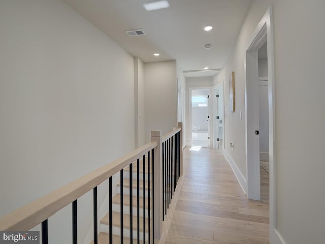 hall featuring light hardwood / wood-style flooring