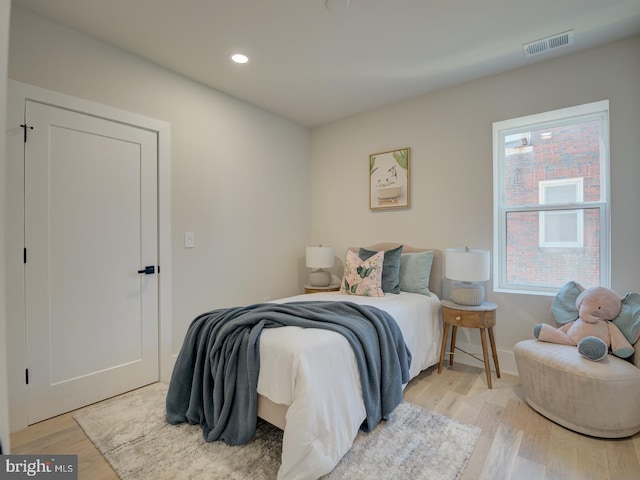 bedroom featuring light hardwood / wood-style flooring