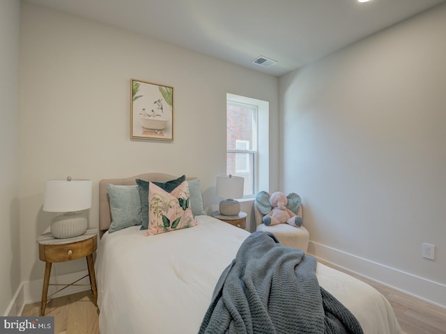 bedroom featuring light hardwood / wood-style floors