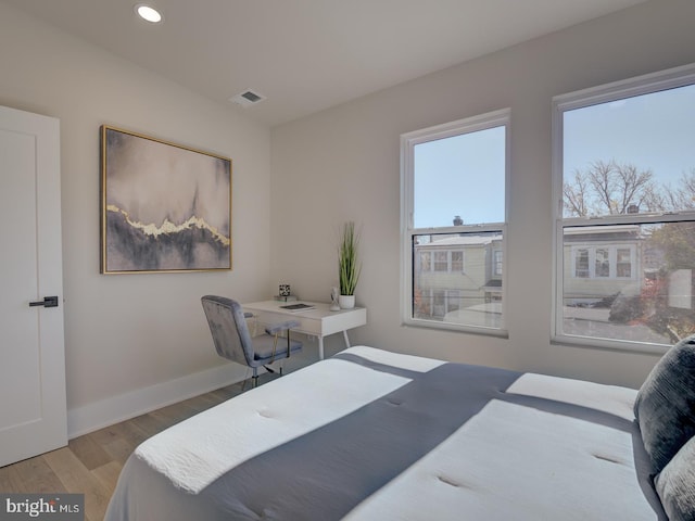 bedroom featuring light hardwood / wood-style flooring