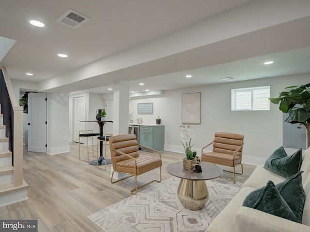 sitting room with light hardwood / wood-style flooring