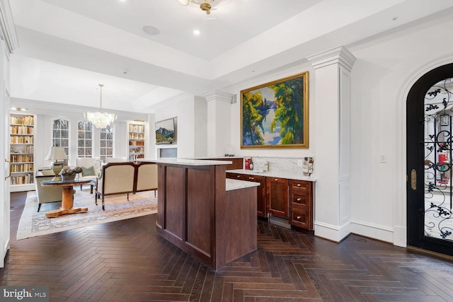 4825 Dexter Ter NW, Washington, DC 20007 - bar area with baseboards, arched walkways, hanging light fixtures, a raised ceiling, and recessed lighting