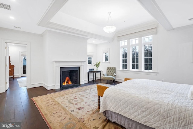 4825 Dexter Ter NW, Washington, DC 20007 - bedroom featuring dark wood-style flooring, a lit fireplace, baseboards, recessed lighting, and a baseboard radiator