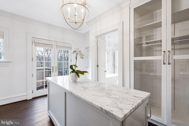 4825 Dexter Ter NW, Washington, DC 20007 - spacious closet featuring french doors, a chandelier, and dark wood-style floors