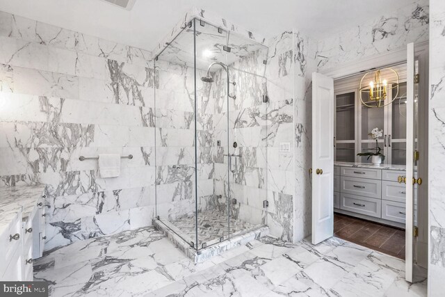 4825 Dexter Ter NW, Washington, DC 20007 - full bathroom with a marble finish shower, a chandelier, and vanity