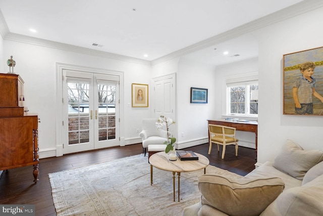 living room with ornamental molding, dark wood-type flooring, and french doors