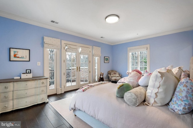 bedroom with hardwood / wood-style floors, crown molding, access to outside, and french doors