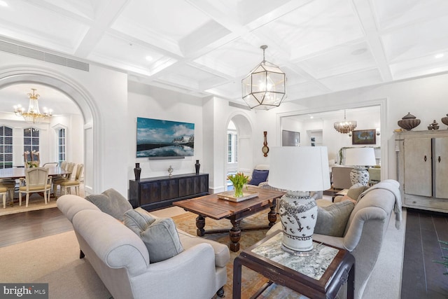 4825 Dexter Ter NW, Washington, DC 20007 - living area with a chandelier, arched walkways, coffered ceiling, beamed ceiling, and wood finished floors