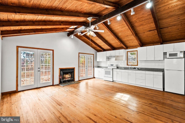 kitchen featuring white cabinets, french doors, light hardwood / wood-style flooring, and white appliances