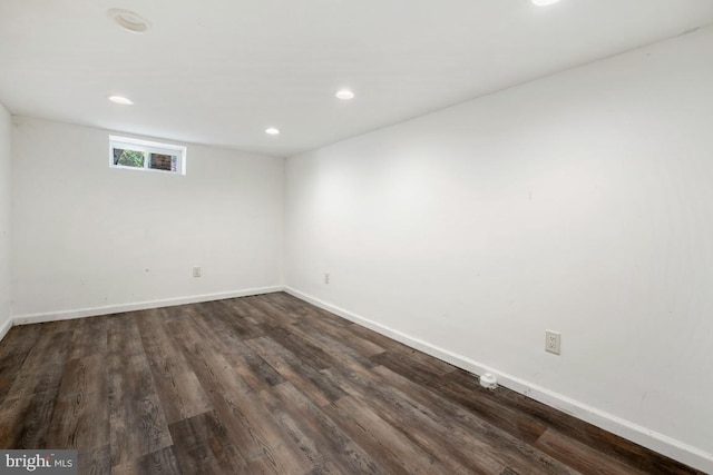 empty room featuring dark hardwood / wood-style floors