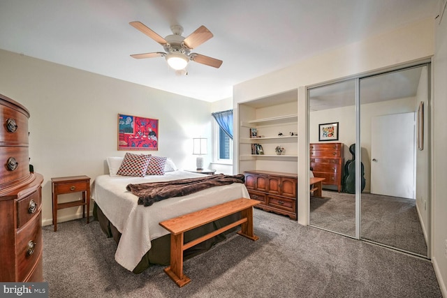 bedroom featuring ceiling fan, dark colored carpet, and a closet