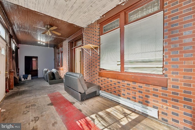 interior space featuring ceiling fan