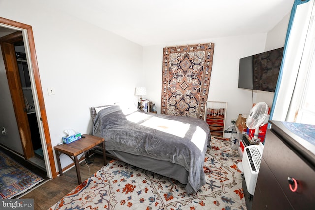 bedroom featuring hardwood / wood-style floors