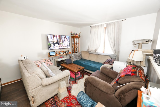 living room with dark wood-type flooring