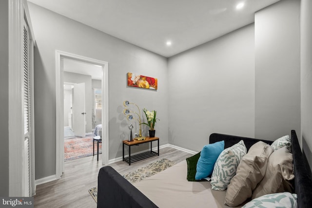 bedroom with light hardwood / wood-style flooring