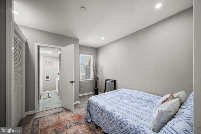 bedroom featuring hardwood / wood-style floors