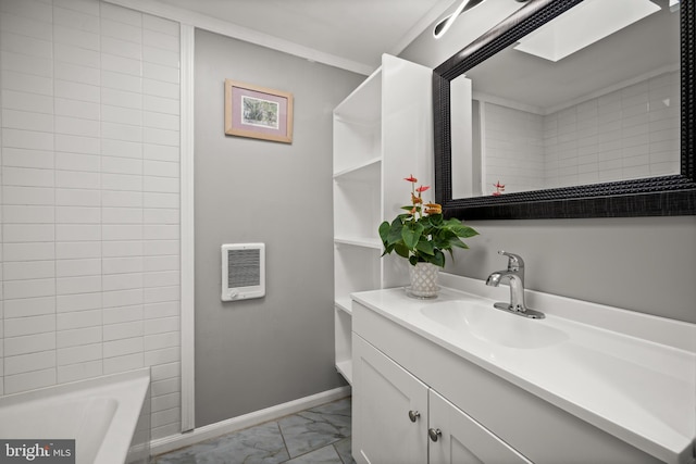 bathroom with vanity, tiled shower / bath combo, a skylight, and heating unit