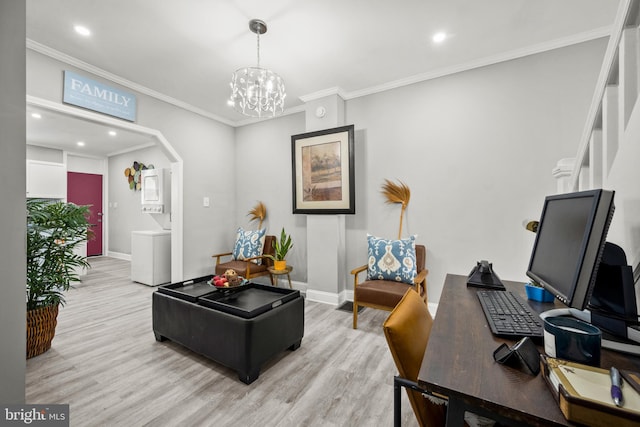 living room featuring ornamental molding, light wood-type flooring, and a chandelier