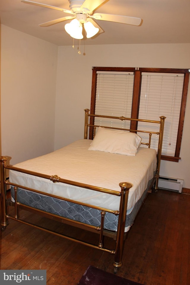 61 S Carl Ave, Greencastle, PA 17225 - bedroom featuring hardwood / wood-style flooring, a baseboard heating unit, and ceiling fan