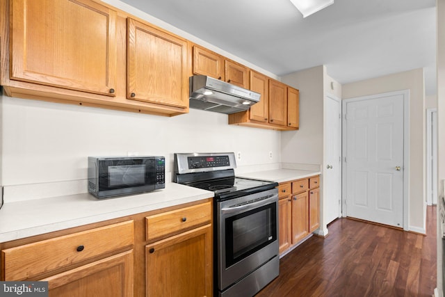 kitchen featuring dark hardwood / wood-style flooring and stainless steel range with electric cooktop