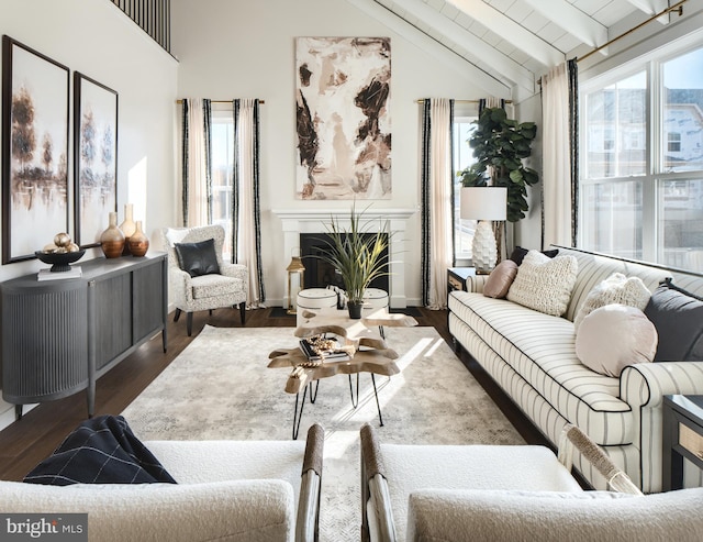 living room featuring lofted ceiling with beams, dark wood-type flooring, and wood ceiling