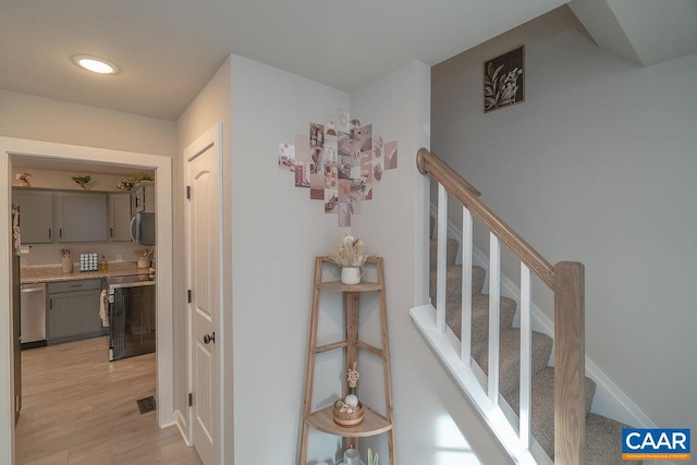 hallway featuring light hardwood / wood-style flooring