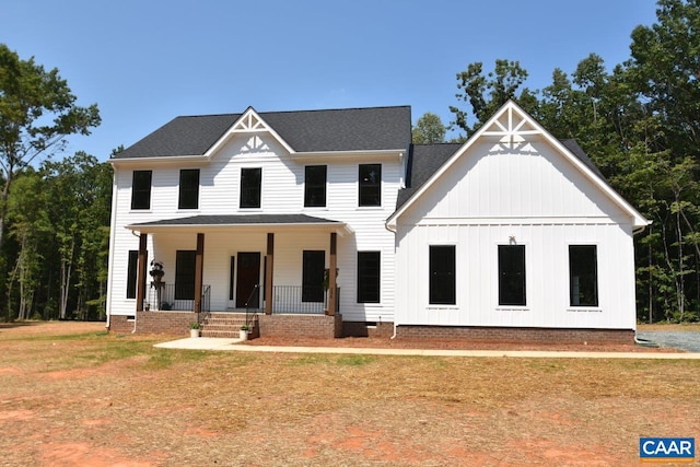 modern farmhouse style home with a porch