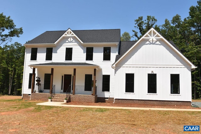 modern inspired farmhouse with covered porch