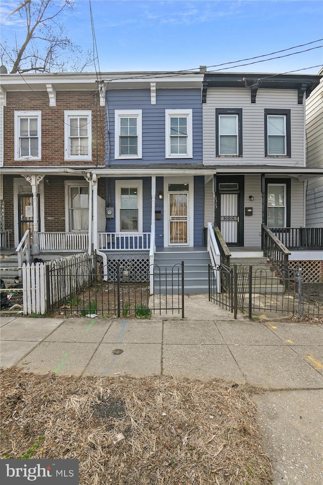 multi unit property featuring covered porch