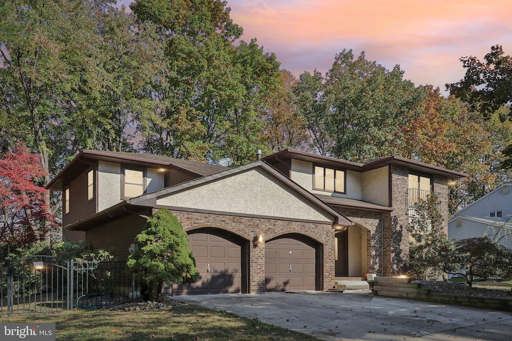 view of front of home with a garage