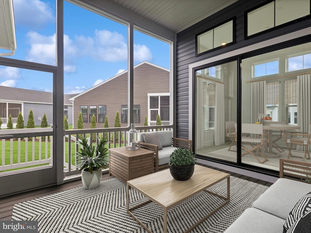 sunroom featuring a healthy amount of sunlight