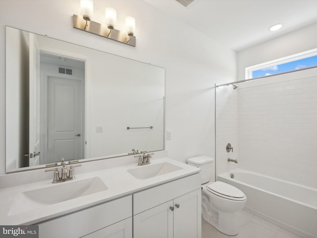 full bathroom featuring vanity, shower / bath combination, and toilet