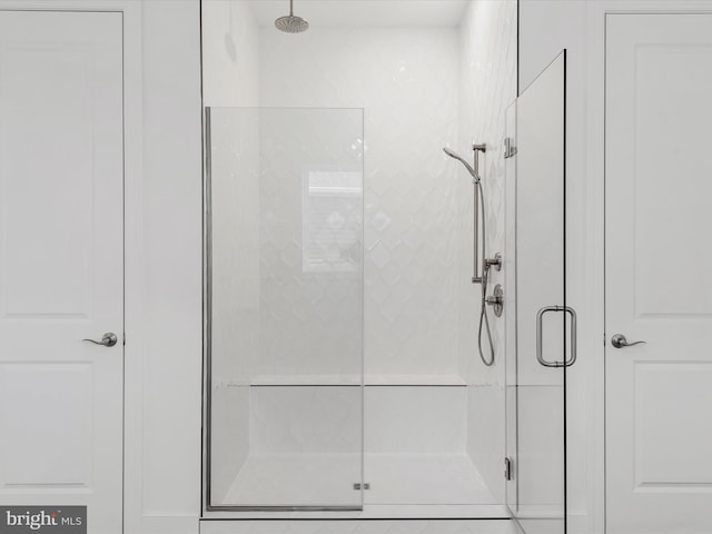 bathroom with an enclosed shower