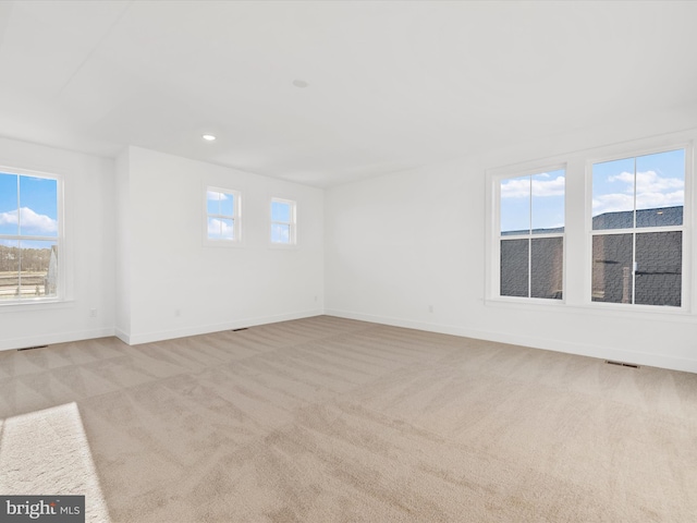 view of carpeted spare room