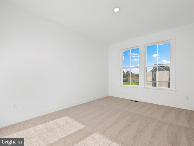 view of carpeted spare room