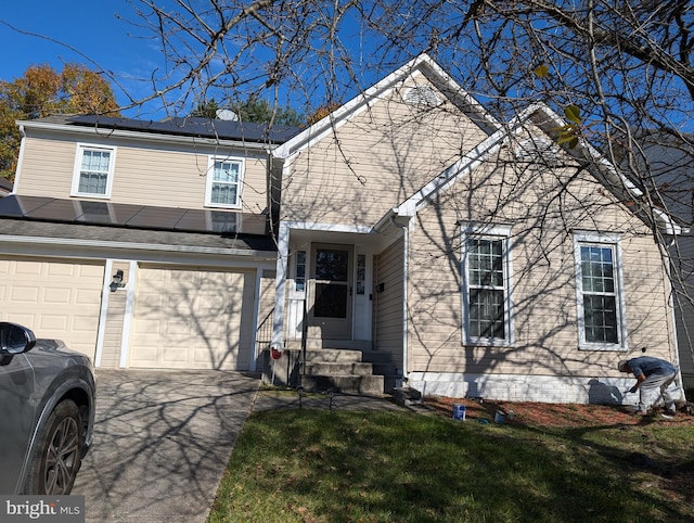 view of front property with a garage